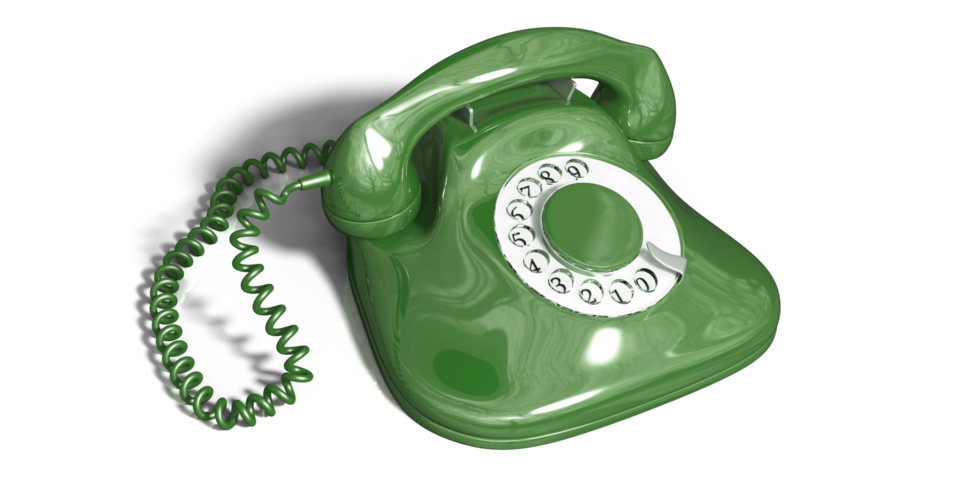 Ein grünes Telefon mit Wählscheibe